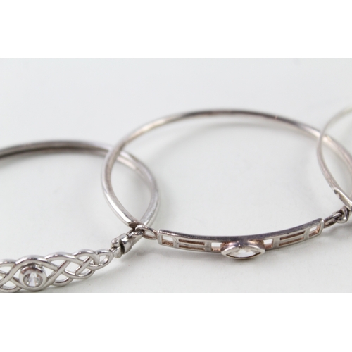 253 - Collection of Sterling Silver Bangles inc. CZ, Celtic Designs x 4 34g