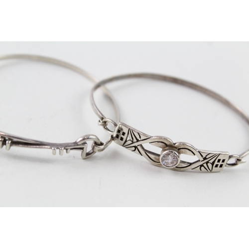 253 - Collection of Sterling Silver Bangles inc. CZ, Celtic Designs x 4 34g