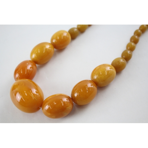 279 - Amber & Early Plastic Graduated Bead Necklace w/ Screw Clasp 83g