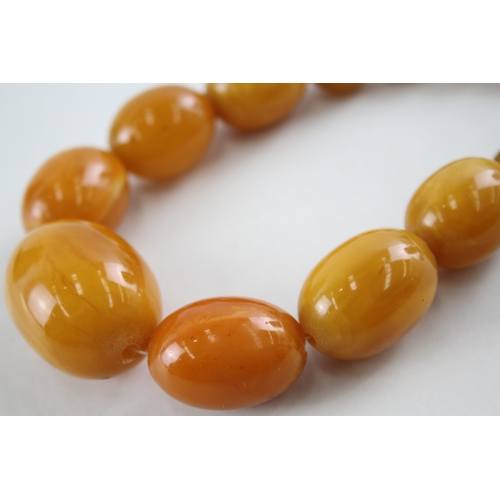 279 - Amber & Early Plastic Graduated Bead Necklace w/ Screw Clasp 83g