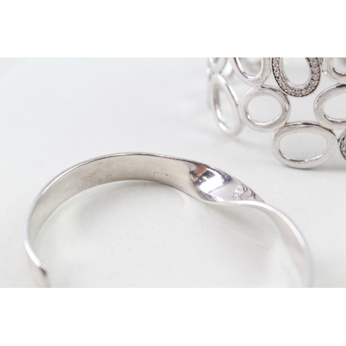 313 - Collection of Sterling Silver Bangles inc. CZ, Twist, Textured x 2 59g