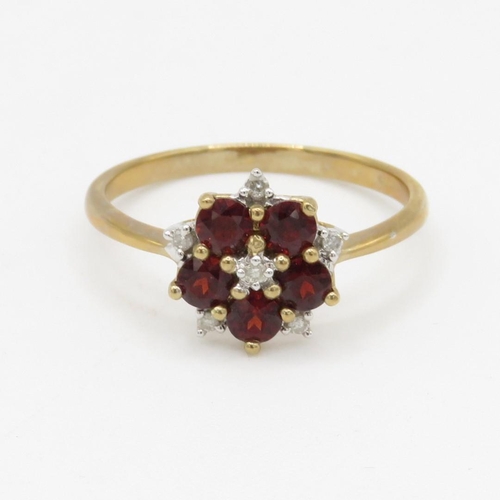 233 - 9ct gold diamond and garnet flower cluster ring (2.7g) Size U 1/2