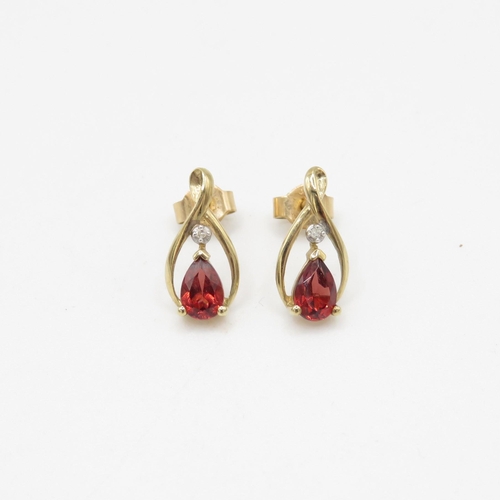 250 - 9ct gold garnet and diamond drop stud earrings (1.2g)