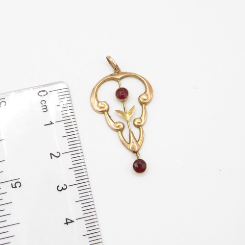 108 - 9ct gold with paste top stone and garnet lower stone pendant (1g)