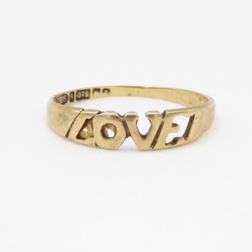 120 - 9ct gold love ring (1.2g) Size M