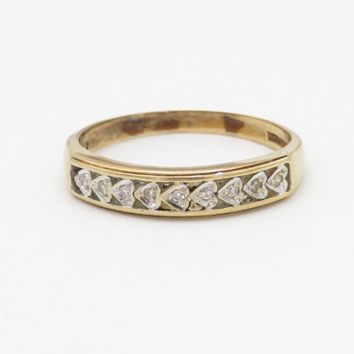 132 - 9ct gold diamond heart shape half eternity ring (2.5g) Size Q