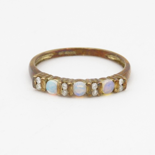 161 - 9ct gold opal and diamond row ring (1.8g) Size S