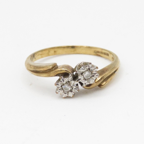 59 - 9ct gold two stone diamond ring (2.4g) Size P