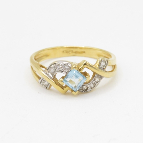 61 - 18ct gold blue topaz and cubic zirconia ring (3.1g) Size O