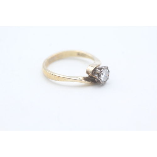 102 - 9ct gold laser drilled diamond ring (2.1g) Size J 1/2