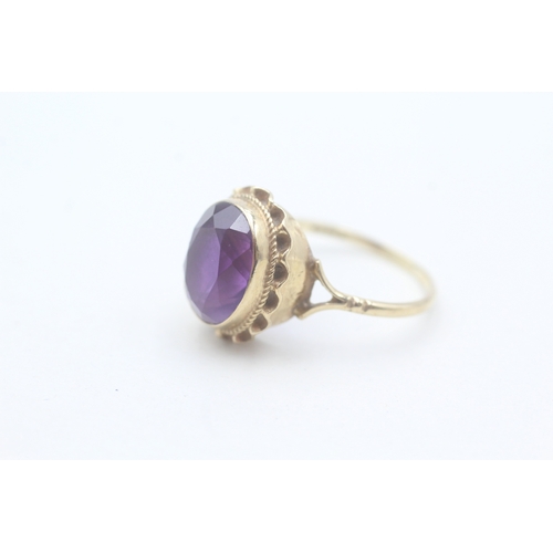 103 - 9ct gold and large amethyst set ring (3.2g) Size Q