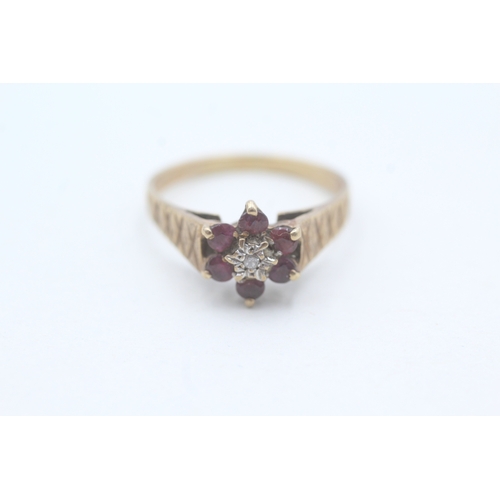 105 - 9ct gold ruby and diamond flower cluster ring (2.7g) Size Q 1/2