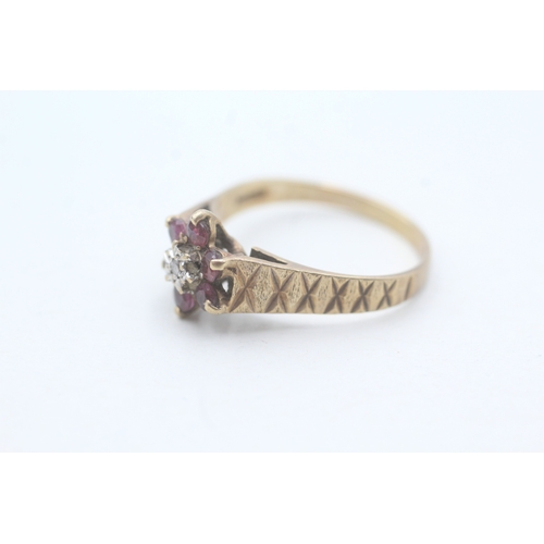 105 - 9ct gold ruby and diamond flower cluster ring (2.7g) Size Q 1/2