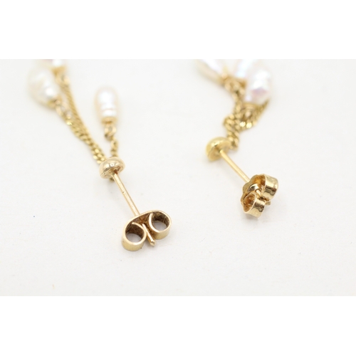 115 - 9ct gold rice pearl drop earrings (1.4g)