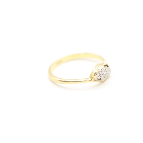 116 - 18ct gold and platinum diamond trilogy twist ring (1.9g) Size M