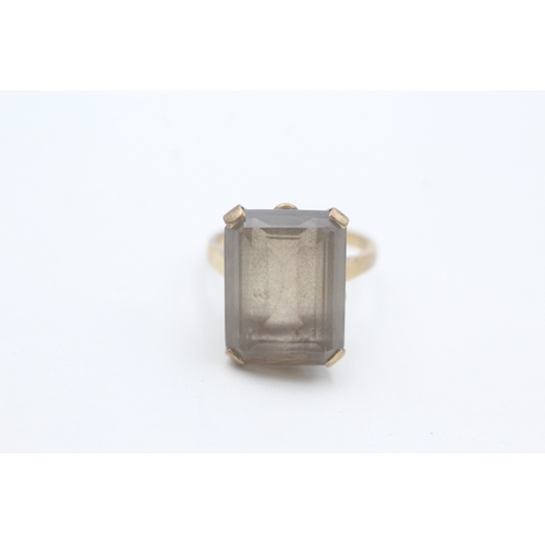 131 - 9ct gold smokey quartz cocktail ring (4.7g) Size L