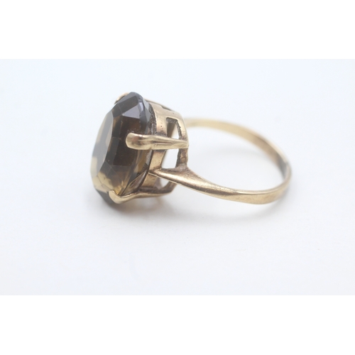 137 - 9ct gold smokey quartz cocktail ring (5.6g) Size P