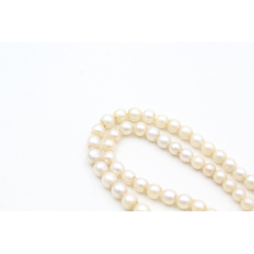 139 - 9ct gold graduated cultured pearl necklace (14.1g)