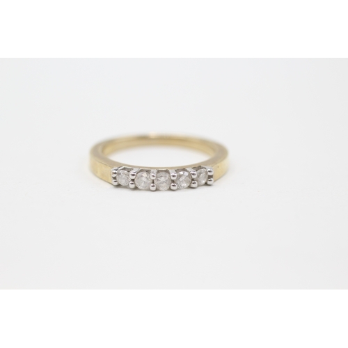 141 - 9ct gold diamond row ring (2.4g) Size K