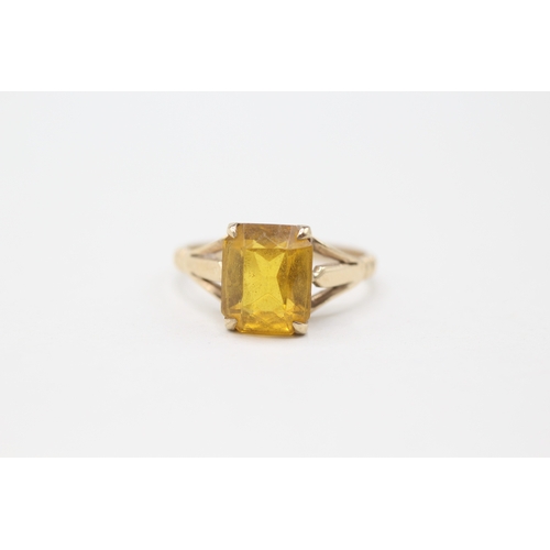 145 - 9ct gold orange paste single stone ring (2.9g) Size O