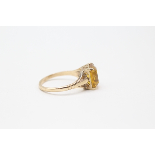 145 - 9ct gold orange paste single stone ring (2.9g) Size O