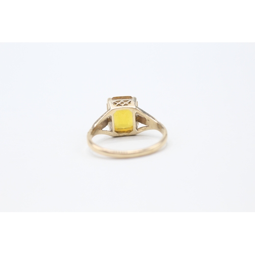 145 - 9ct gold orange paste single stone ring (2.9g) Size O