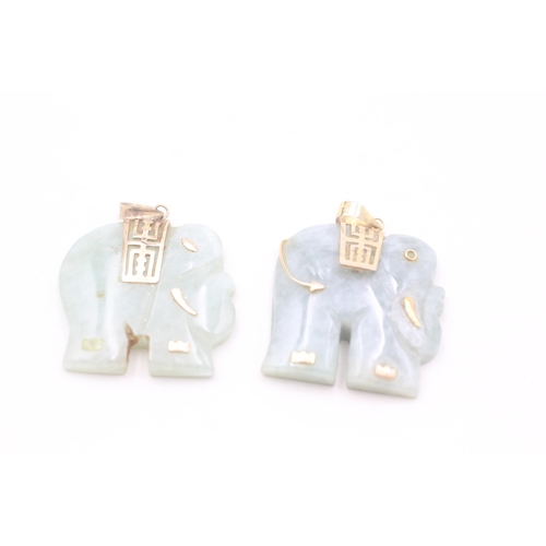 160 - 2 x 9ct gold and jade elephant pendants (14.4g)