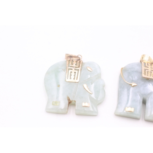 160 - 2 x 9ct gold and jade elephant pendants (14.4g)