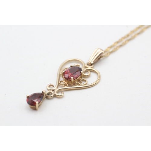 167 - 9ct gold garnet pendant necklace (2.4g)