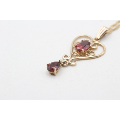 167 - 9ct gold garnet pendant necklace (2.4g)