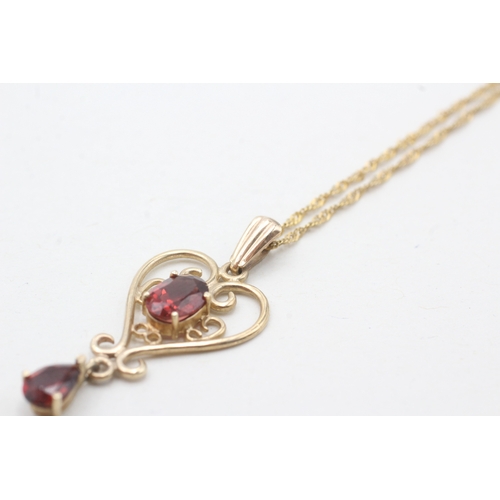 167 - 9ct gold garnet pendant necklace (2.4g)