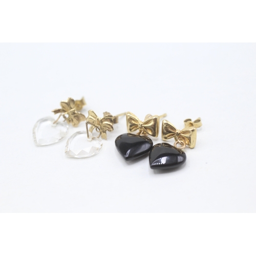 176 - 2 x 9ct gold black onyx and paste stud earrings (2.6g)