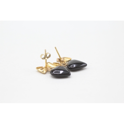 176 - 2 x 9ct gold black onyx and paste stud earrings (2.6g)