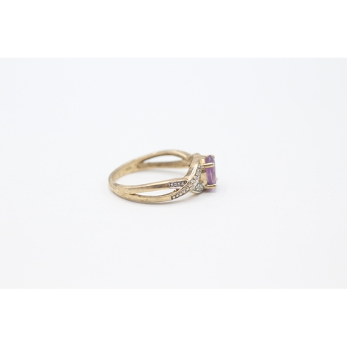 188 - 9ct gold diamond and amethyst twist ring (2.2g) Size M 1/2