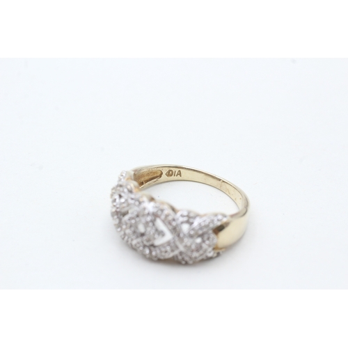 193 - 9ct gold diamond dress ring (3.5g) Size N 1/2