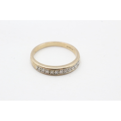 194 - 9ct gold diamond half eternity ring (1.8g) Size M 1/2