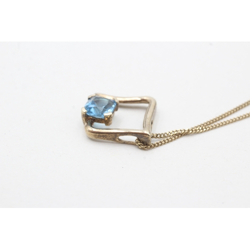 195 - 9ct gold topaz single stone pendant necklace (2.9g)