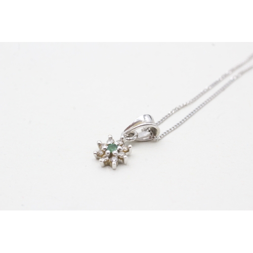 197 - 9ct white gold diamond & emerald floral cluster pendant necklace (1.4g)