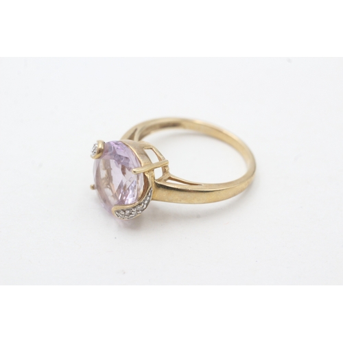 200 - 9ct gold amethyst single stone ring with diamond highlight (3.2g) Size N