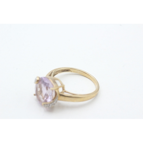 200 - 9ct gold amethyst single stone ring with diamond highlight (3.2g) Size N