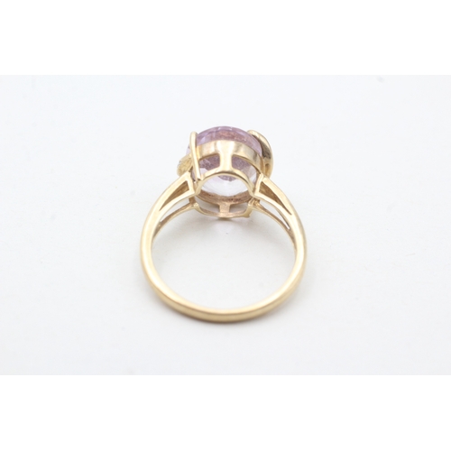 200 - 9ct gold amethyst single stone ring with diamond highlight (3.2g) Size N