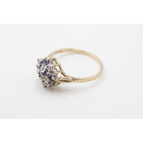 203 - 9ct gold diamond & sapphire floral cluster ring (2.1g) Size P