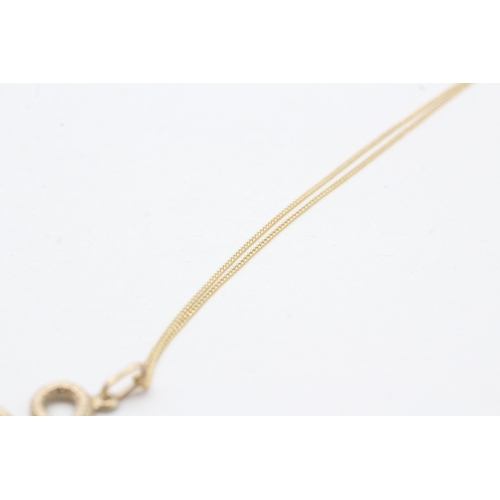 210 - 9ct gold snake pendant necklace (1.1g)