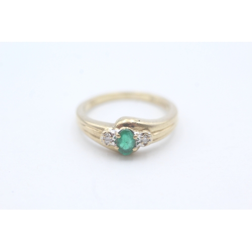 216 - 9ct gold emerald and diamond ring (2.4g) Size L