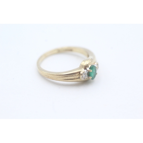 216 - 9ct gold emerald and diamond ring (2.4g) Size L