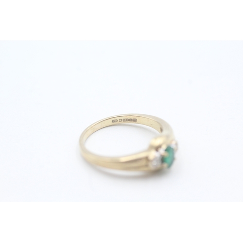 216 - 9ct gold emerald and diamond ring (2.4g) Size L