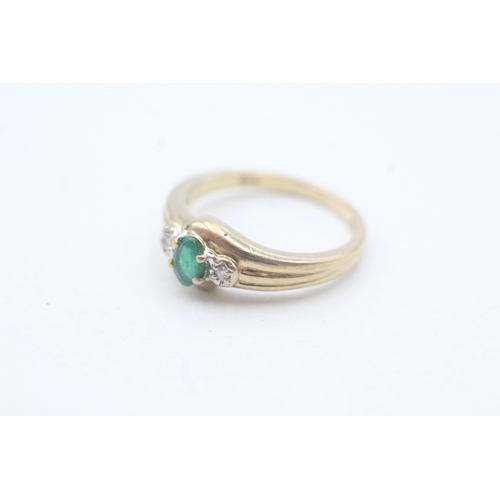 216 - 9ct gold emerald and diamond ring (2.4g) Size L