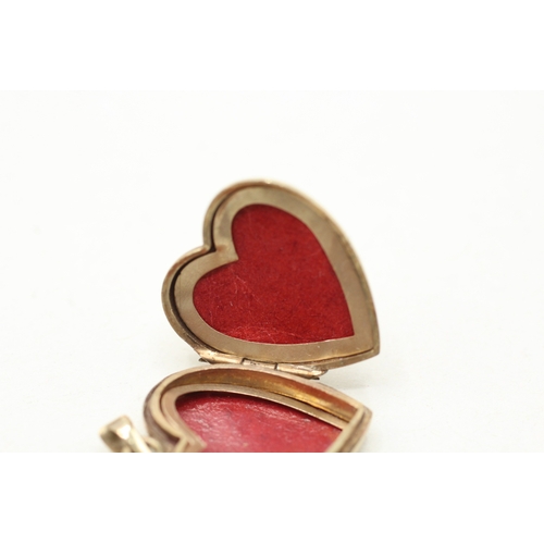 224 - 9ct gold heart locket (2.7g)