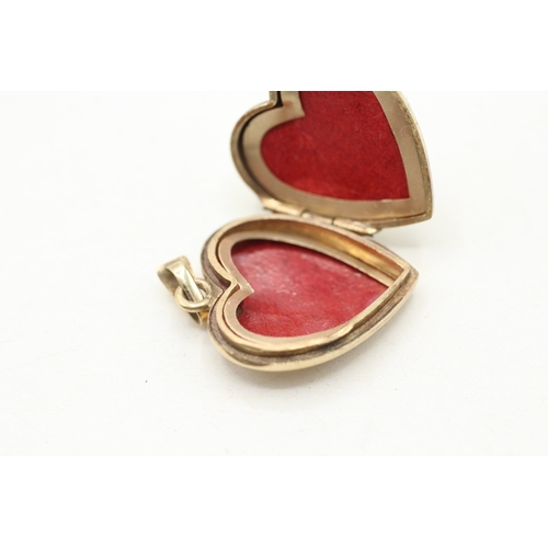 224 - 9ct gold heart locket (2.7g)