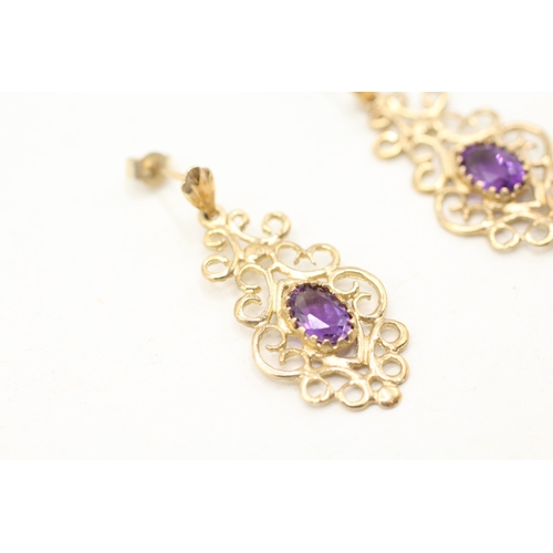 233 - 9ct gold amethyst framed drop earrings (1.8g)